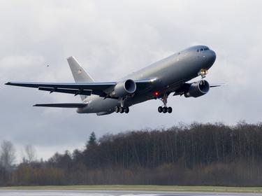 The KC-46A Pegasus aerial refueling aircraft takes off on its maiden flight from Paine Field in Everett, Washington, December 28, 2014