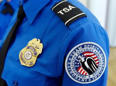 A TSA arm patch and shield at Los Angeles International Airport, California, February 20, 2014