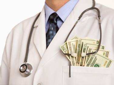 doctor with money in pocket