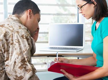 A soldier in a counseling session