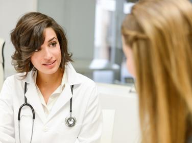 Doctor explaining diagnosis to her female patient 