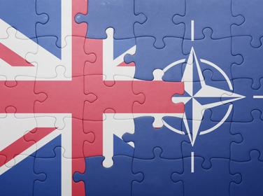 Puzzle with the flags of Great Britain and NATO