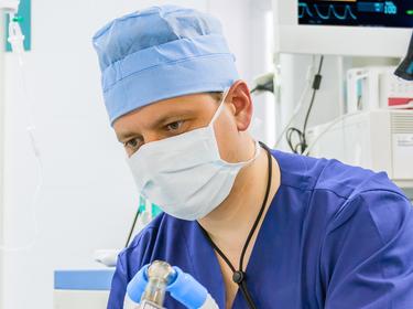 anesthesiologist with mask