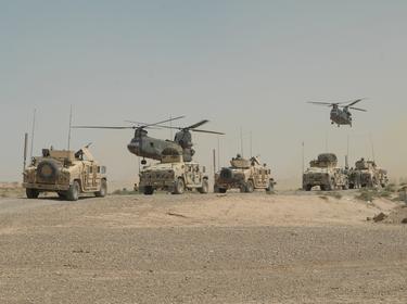 CH-47 Chinook helicopters land outside of the village of Abd al Hasan, Iraq, to pick up U.S. and Iraqi Army Soldiers