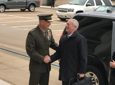 New U.S. Defense Secretary James Mattis is greeted by Marine General Joseph Dunford, chairman of the Joint Chiefs of Staff, as he arrives at the Pentagon outside Washington, U.S.,  January 21, 2017