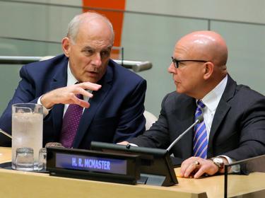 White House Chief of Staff John Kelly (left) speaks with U.S. National Security Advisor H.R. McMaster at U.N. headquarters in New York City, September 18, 2017