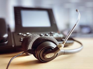 Call center telephone and headset