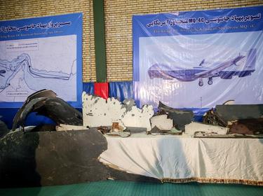 The purported wreckage of an American drone is seen displayed by the Islamic Revolution Guards Corps (IRGC) in Tehran, Iran, June 21, 2019, photo by Meghdad Madadi/Tasnim News Agency via Reuters