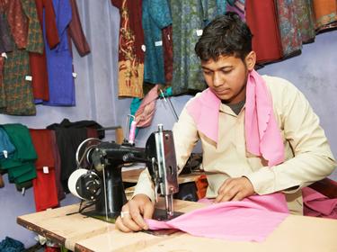 Tailor working in shop in Bangladesh