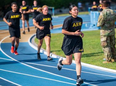 Spc. Kiana Malbas, an automated logistical specialist, performs a two-mile run during a diagnostic Army Combat Fitness Test in Los Angeles, California, July 17, 2021, photo by SFC Christopher Oposnow/U.S. Army