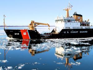 The crew of the Coast Guard Guard Cutter Hollyhock, homeported in Port Huron, Mich., transits Lake St. Clair en route to the western basin of Lake Erie for ice-breaking operations, Jan. 13, 2015. U.S. and Canadian Coast Guard ice breakers, as part of Operations Coal Shovel and Taconite, have been working tirelessly to keep vessel traffic and important economic supplies moving throughout the Great Lakes. 
