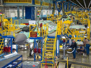 Lockheed Martin employees work on the F-35 Lightning II joint strike fighter production line in Fort Worth, Texas, December 24, 2012, photo by Defense Contract Management Agency