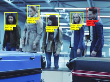 Facial recognition software used at an airport, photo by izusek/Getty Images